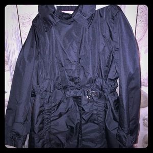Girls black, mid-length rain coat